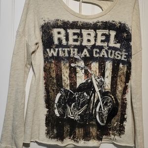 THE CLAS-SIC  CUT OUT BACK SHIRT.